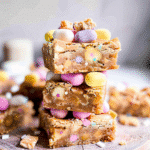 Mini Egg Blondies 13 Stack of mini egg blondies topped with colorful chocolate eggs