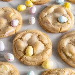 Mini egg cookies recipe 11 mini egg cookies served with a glass of milk on a neutral background