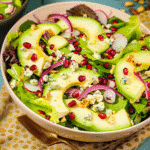 Avocado Pear Recipes You’ll Love Forever 13 Avocado Pear Recipes with pomegranate and onions in a white bowl